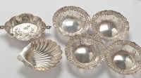 Lot 249 - A set of four Victorian silver bonbon dishes,...