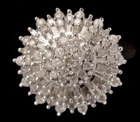 Lot 427 - A diamond dress ring, set with multiple tiers...