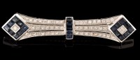 Lot 484 - An Art Deco style sapphire and diamond brooch,...