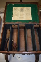 Lot 213 - A Vintage leather on wood cartridge magazine...