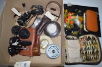 Lot 220 - A pair of Mitchell 300 spinning reels; and...
