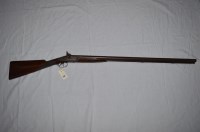 Lot 248 - An antique double-barrel 12 bore muzzle...
