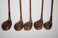 Lot 419 - Five hickory shafted lead weighted woods,...