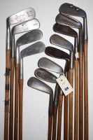 Lot 424 - Twelve hickory shafted irons, to include:...