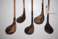Lot 464 - Five hickory shafted drivers, some with lead...