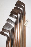 Lot 471 - Eleven hickory shafted irons, to include:...