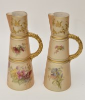 Lot 175 - Pair of Royal Worcester blush ivory ewers,...