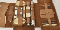 Lot 452 - A George V leather travelling vanity case with...