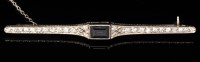 Lot 530 - A sapphire and diamond bar brooch, c.1910, the...