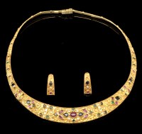 Lot 552 - A gem set tutti frutti necklace and matching...