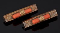 Lot 558 - A pair of coral and yellow metal brooches,...