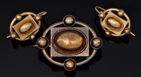 Lot 563 - A mid 19th Century yellow metal matching...