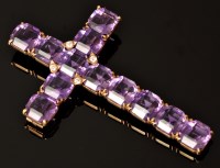 Lot 569 - An amethyst and diamond crucifix pattern...