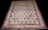 Lot 692 - A Qum carpet, with boteh decoration to field,...