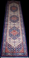 Lot 693 - A Tabriz runner, the three medallions with...