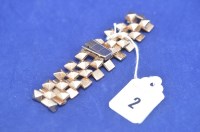 Lot 2 - A 9ct. yellow gold gentleman's bracelet,...