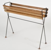 Lot 1005 - A 1950's teak and wirework plant stand, 79 x...