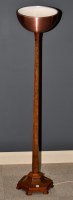 Lot 1057 - An Art Deco walnut uplighter, with metal shade,...