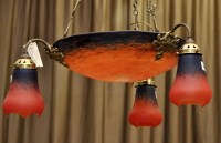 Lot 1085 - A brass mounted blue and red coloured glass...
