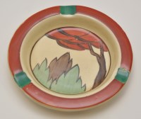 Lot 1110 - Clarice Cliff, Limberlost: a circular ashtray,...