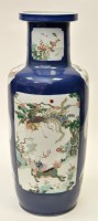 Lot 38 - Chinese powder blue ground rouleau vase, with...
