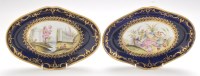 Lot 97 - Pair of Coalport deep blue ground oval shape...