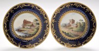 Lot 99 - Pair of Coalport deep blue ground 'landscape'...