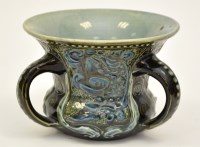 Lot 290 - An H. Brannam for Barum three-handled vase,...