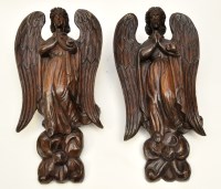 Lot 307 - A pair of early 20th Century carved oak angels,...