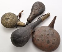 Lot 381 - An English embossed copper powder flask;...