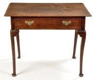 Lot 800 - A Georgian rectangular oak lowboy, the...