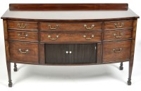 Lot 864 - A mahogany bowfront sideboard, with small...