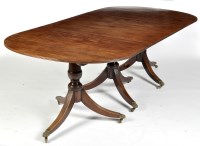 Lot 873 - A George III style mahogany three pillar...