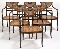 Lot 885 - A set of six Regency black lacquered painted...