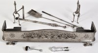 Lot 894 - A 19th Century brushed steel pierced fender,...