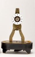 Lot 929 - A 19th Century French skeleton clock of simple...