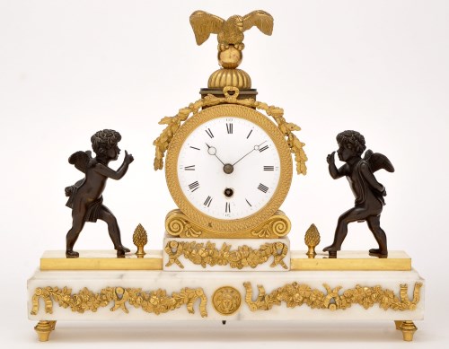 Lot 931 - A French Empire ormolu, bronze and white...