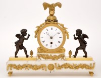 Lot 931 - A French Empire ormolu, bronze and white...