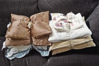 Lot 2 - Two bundles of miscellaneous modern cushions,...