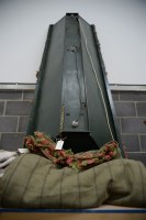 Lot 13 - A green tweed cover with bright green lining...