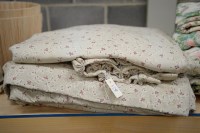 Lot 16 - A pair of large curtains, floral pattern on...