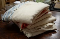 Lot 25 - A collection of 19th Century woollen blankets,...