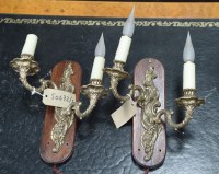 Lot 40 - A pair of modern ornate brass Regency style...