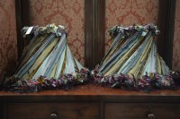 Lot 54 - A pair of modern tapering circular standard...