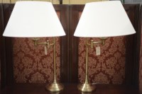Lot 55 - A pair of modern lacquered brass adjustable...