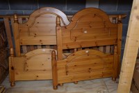 Lot 75 - A pair of modern pine single bedsteads,...