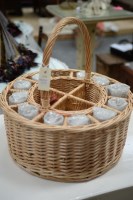 Lot 108 - A circular cocktail basket containing twelve...