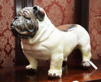 Lot 110 - A large painted cast resin figure in the form...