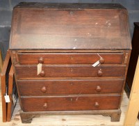Lot 126 - A 18th Century stained oak bureau, the...