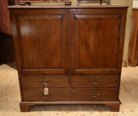 Lot 146 - A George III mahogany linen press cupboard,...